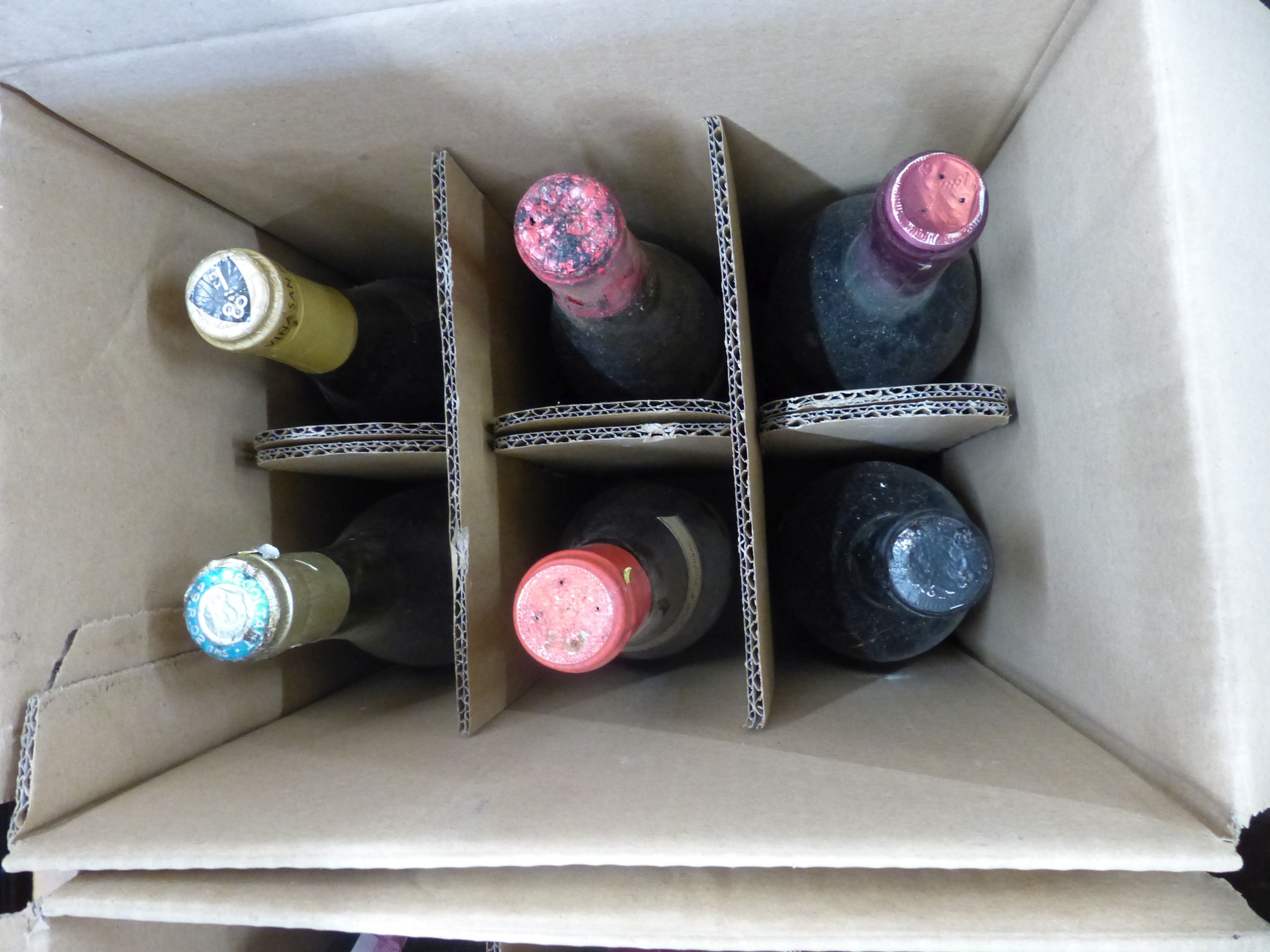 Approximately 74 bottles of assorted wines and spirits including Cahors 1978, Chateau du Cricastin 1979, etc.